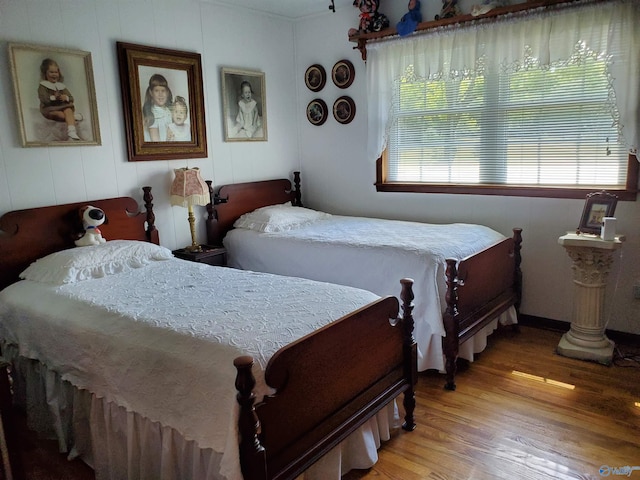 bedroom with light wood-type flooring