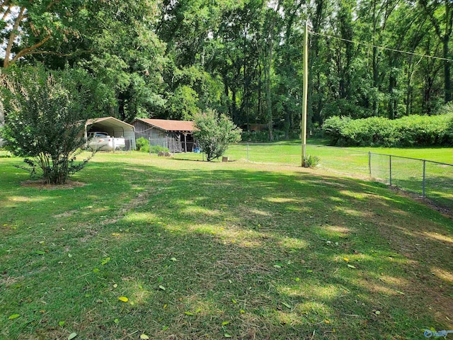 view of yard featuring a carport