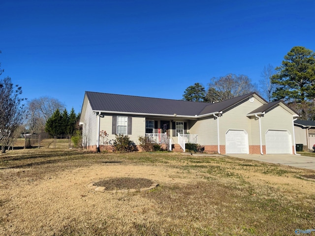 single story home with a porch, a garage, and a front lawn