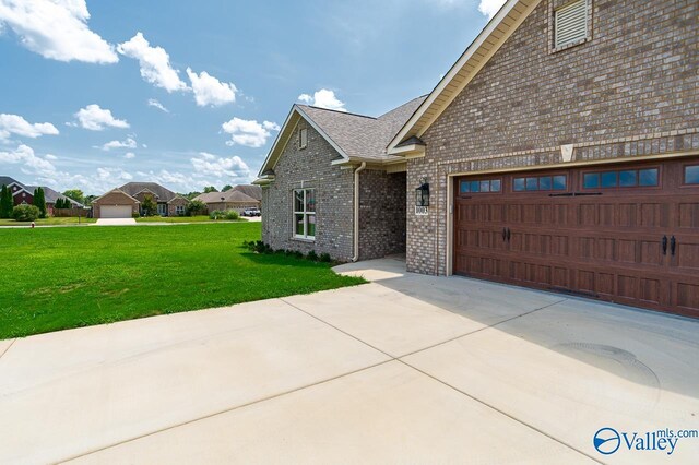 rear view of property featuring an outdoor structure