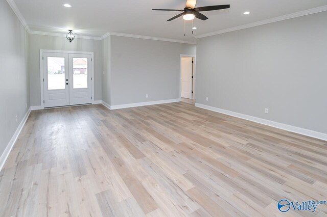 unfurnished living room with light hardwood / wood-style floors, french doors, and ceiling fan