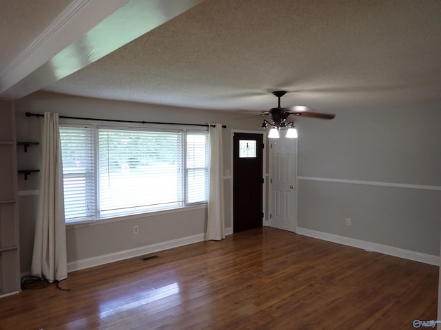 724 Frost St SW, Hartselle, AL 35640 - unfurnished living room with a ceiling fan, wood finished floors, and a textured ceiling