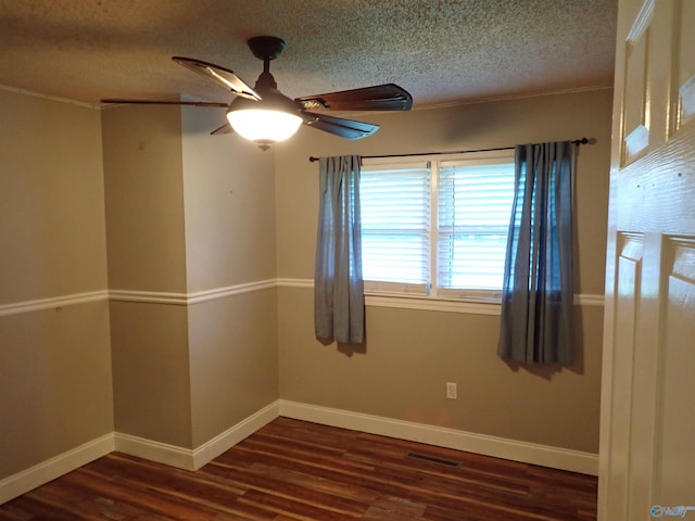 724 Frost St SW, Hartselle, AL 35640 - spare room featuring a textured ceiling, wood finished floors, a ceiling fan, and crown molding