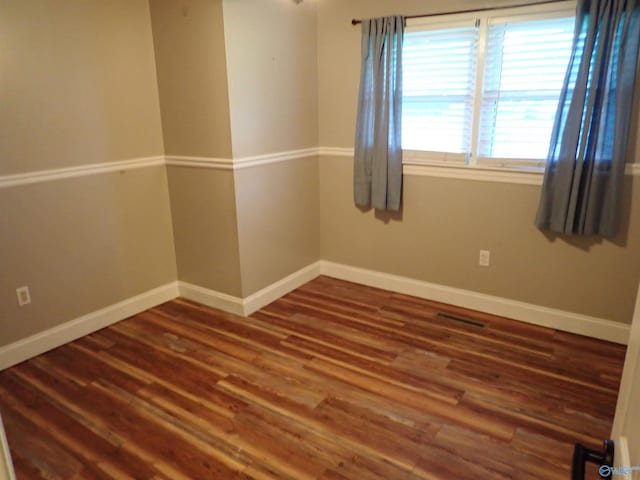 724 Frost St SW, Hartselle, AL 35640 - spare room with wood finished floors