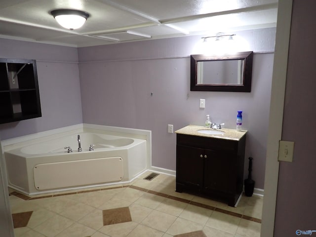 724 Frost St SW, Hartselle, AL 35640 - bathroom featuring vanity, a bath, and tile patterned floors