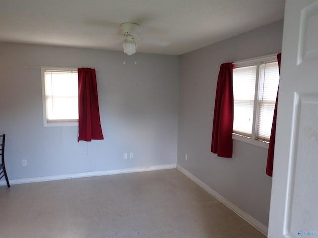 724 Frost St SW, Hartselle, AL 35640 - unfurnished room with a ceiling fan and baseboards