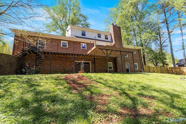 back of house featuring a lawn