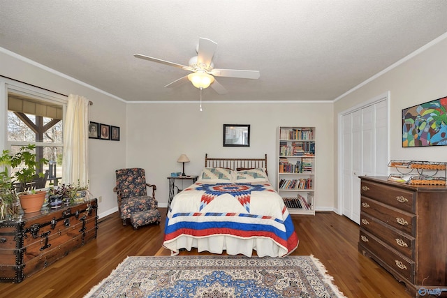 16904 Linton Rd, Athens, AL 35613 - bedroom with wood finished floors, ornamental molding, a closet, baseboards, and ceiling fan