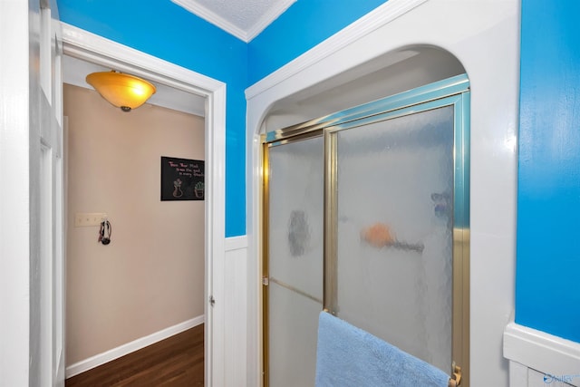 16904 Linton Rd, Athens, AL 35613 - full bathroom featuring a shower stall, wood finished floors, baseboards, and ornamental molding