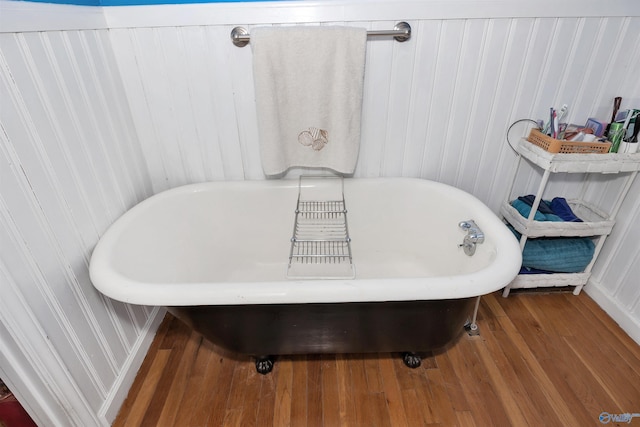 16904 Linton Rd, Athens, AL 35613 - bathroom with a soaking tub and wood finished floors