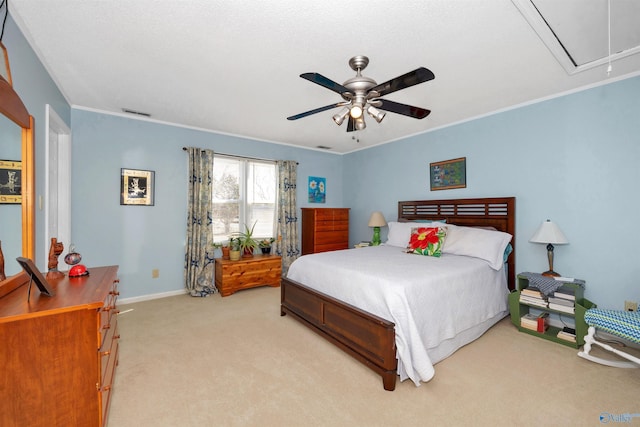 16904 Linton Rd, Athens, AL 35613 - bedroom featuring light carpet, attic access, ornamental molding, a ceiling fan, and baseboards