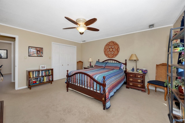 16904 Linton Rd, Athens, AL 35613 - bedroom with light carpet, a closet, crown molding, a ceiling fan, and baseboards
