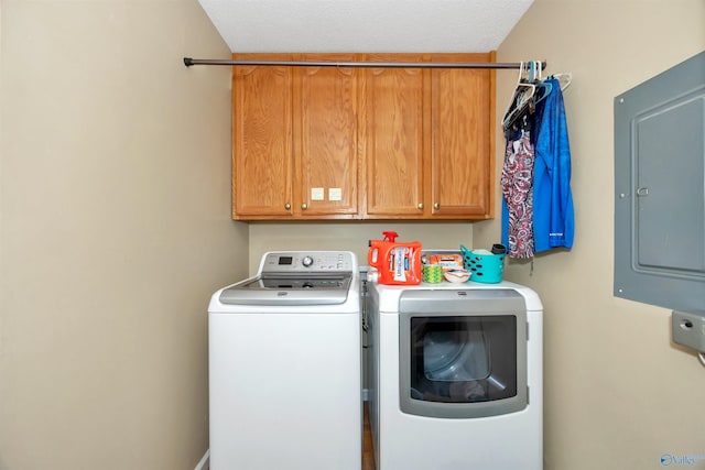 16904 Linton Rd, Athens, AL 35613 - laundry room with cabinet space, washer and clothes dryer, and electric panel