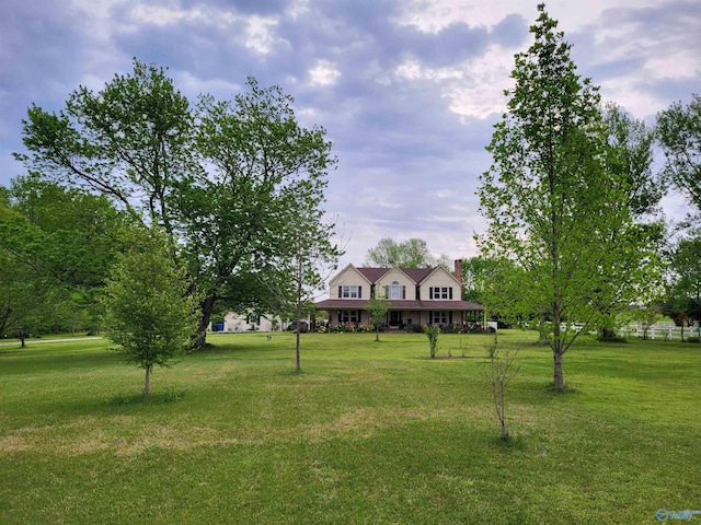 16904 Linton Rd, Athens, AL 35613 - view of front of property with a front yard and a chimney