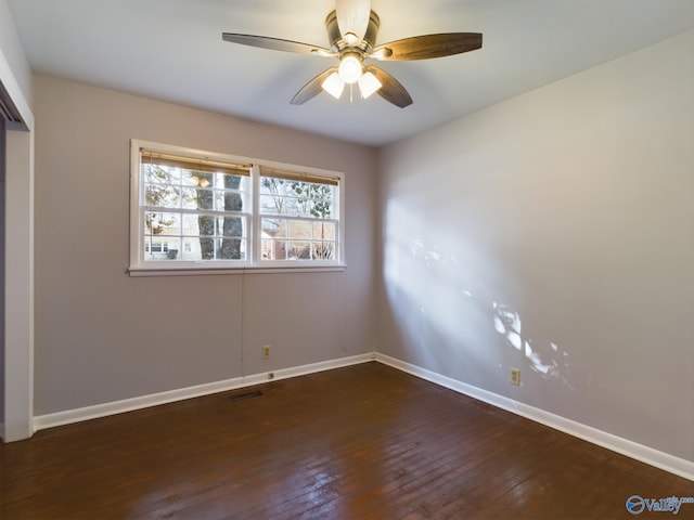 unfurnished bedroom with dark hardwood / wood-style floors and ceiling fan