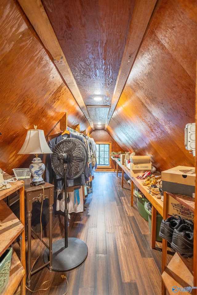 playroom featuring dark hardwood / wood-style floors and vaulted ceiling