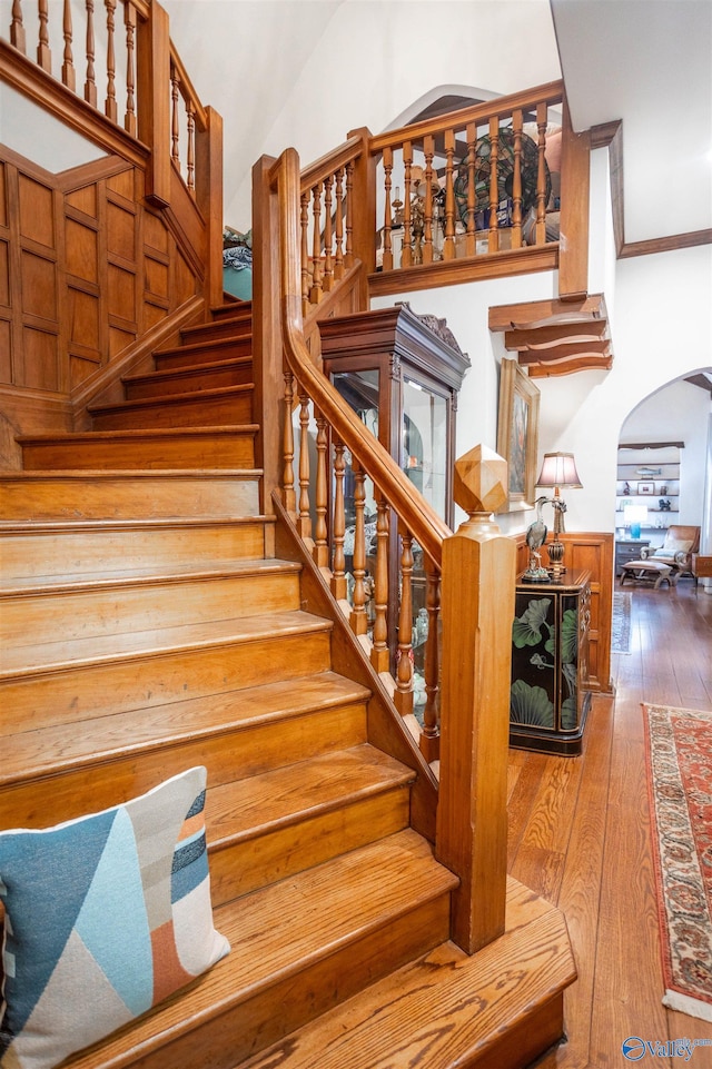 stairway featuring hardwood / wood-style flooring