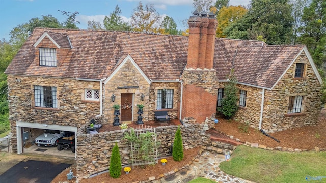 view of front of property with a garage