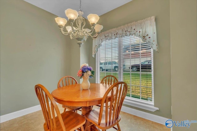 147 Singletree Dr, Hazel Green, AL 35750 - dining area featuring baseboards and an inviting chandelier