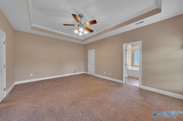 147 Singletree Dr, Hazel Green, AL 35750 - carpeted empty room featuring crown molding, ceiling fan, a raised ceiling, and baseboards