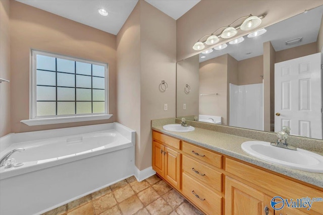 147 Singletree Dr, Hazel Green, AL 35750 - bathroom with walk in shower, double vanity, a garden tub, and a sink
