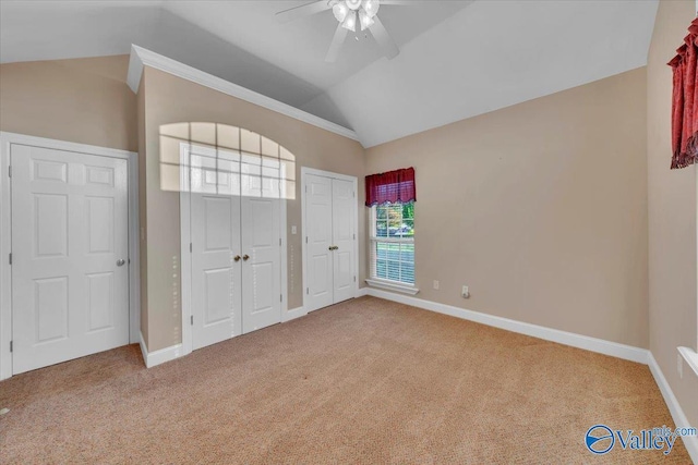 147 Singletree Dr, Hazel Green, AL 35750 - unfurnished bedroom with ceiling fan, baseboards, carpet, and lofted ceiling