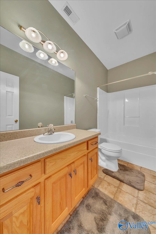 147 Singletree Dr, Hazel Green, AL 35750 - bathroom featuring toilet, tile patterned floors, vanity, and visible vents