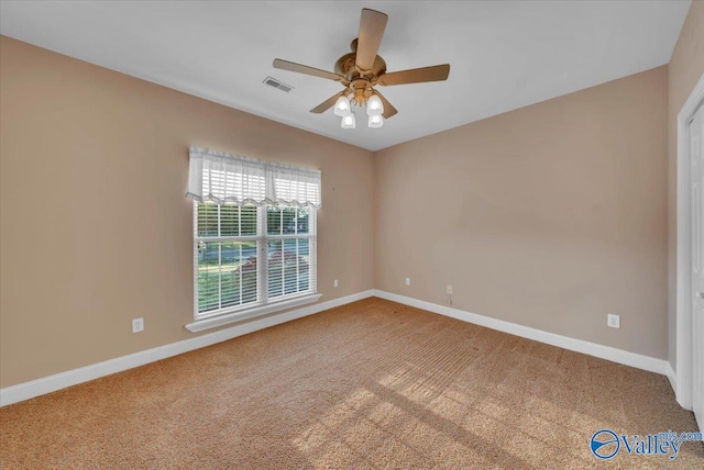 147 Singletree Dr, Hazel Green, AL 35750 - carpeted spare room featuring baseboards, a ceiling fan, and visible vents