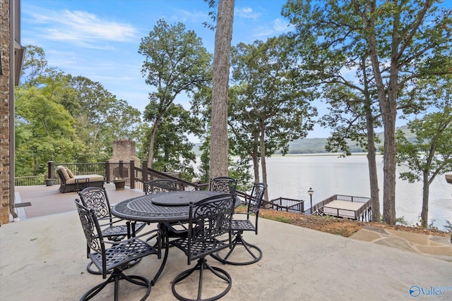 view of patio / terrace with a water view