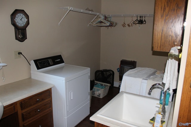 laundry area featuring washer / clothes dryer and sink