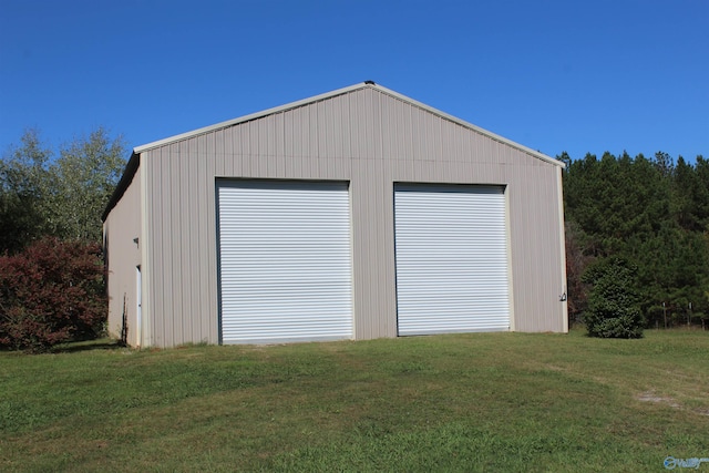 garage with a yard