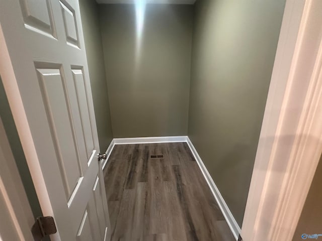 hallway featuring hardwood / wood-style floors