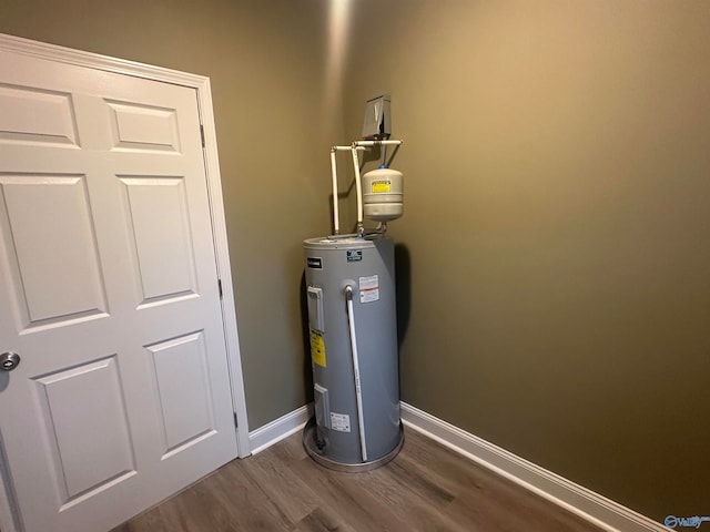 utility room featuring electric water heater