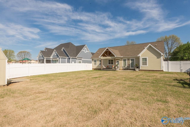 23276 Saint John Rd, Athens, AL 35613 - rear view of house with fence and a yard