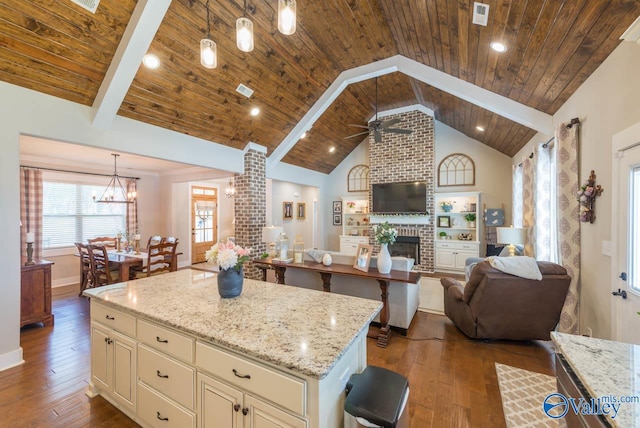 23276 Saint John Rd, Athens, AL 35613 - kitchen featuring wooden ceiling, a fireplace, dark wood-style floors, open floor plan, and ceiling fan with notable chandelier