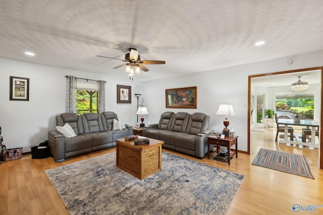7734 Upper Snake Rd, Athens, AL 35614 - living room with recessed lighting, baseboards, ceiling fan, and light wood finished floors