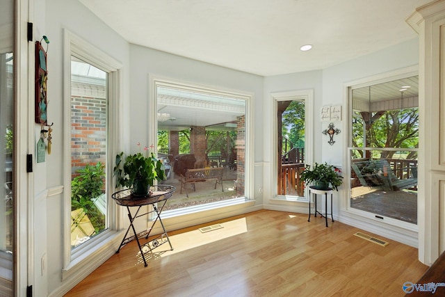 7734 Upper Snake Rd, Athens, AL 35614 - sunroom featuring visible vents, recessed lighting, and wood finished floors