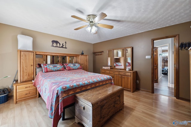 7734 Upper Snake Rd, Athens, AL 35614 - bedroom with a ceiling fan and light wood finished floors