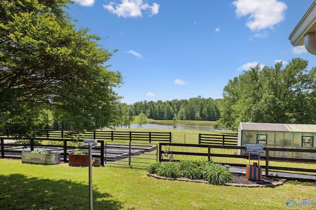 7734 Upper Snake Rd, Athens, AL 35614 - view of yard featuring a water view, fence, and a vegetable garden