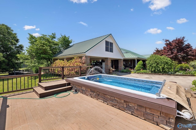 7734 Upper Snake Rd, Athens, AL 35614 - view of swimming pool with a hot tub and a deck