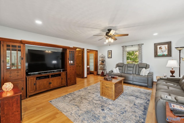 7734 Upper Snake Rd, Athens, AL 35614 - living area with light wood-style floors, a ceiling fan, and recessed lighting