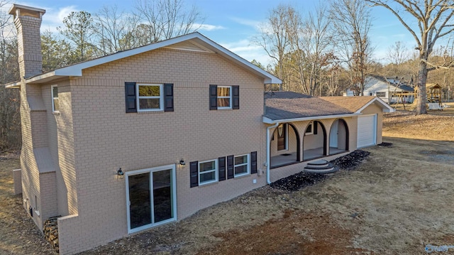 view of property exterior with a garage