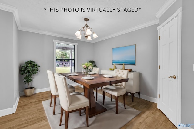 dining space with a notable chandelier, light hardwood / wood-style flooring, and ornamental molding