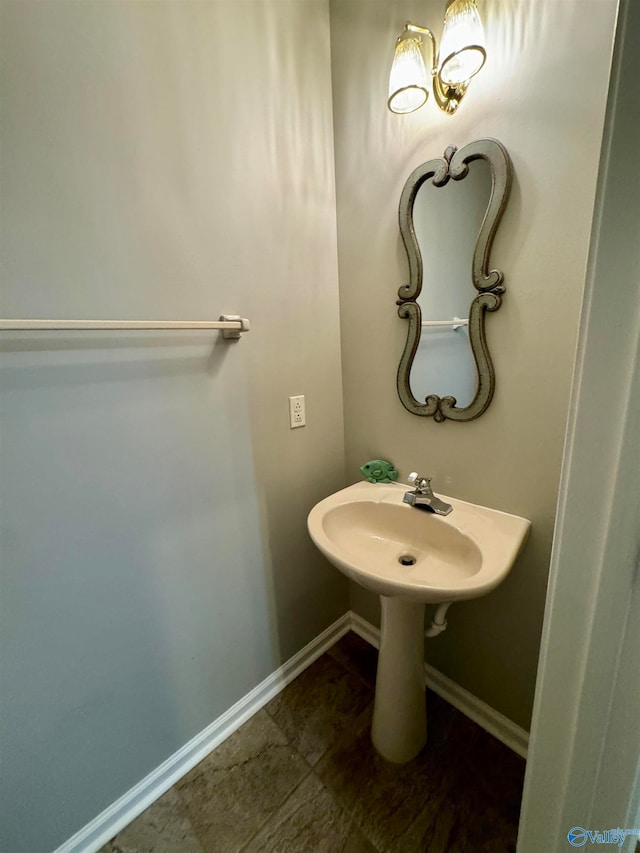 bathroom with tile patterned floors