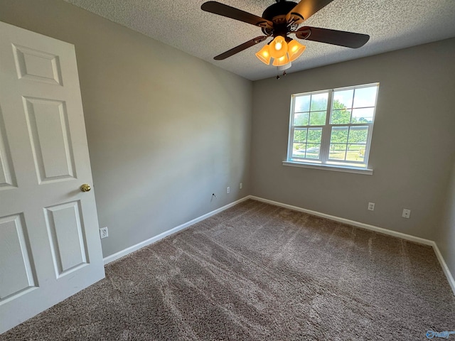 empty room with a textured ceiling, ceiling fan, and carpet flooring