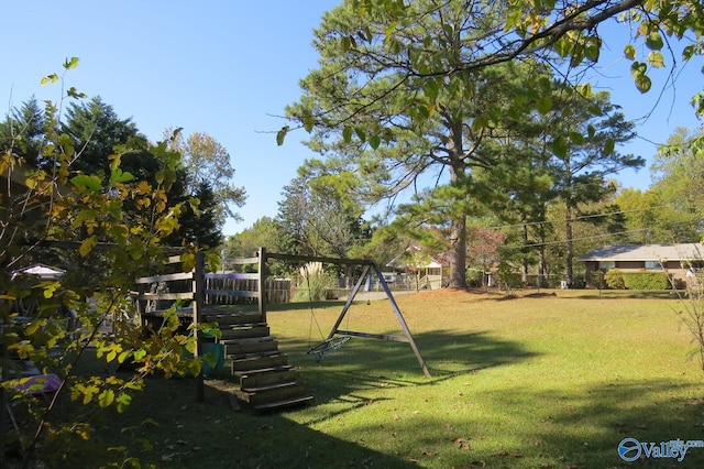 view of play area featuring a lawn