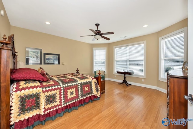 bedroom featuring ceiling fan and hardwood / wood-style floors