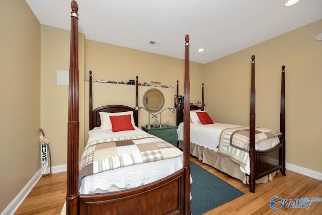 bedroom with light hardwood / wood-style flooring