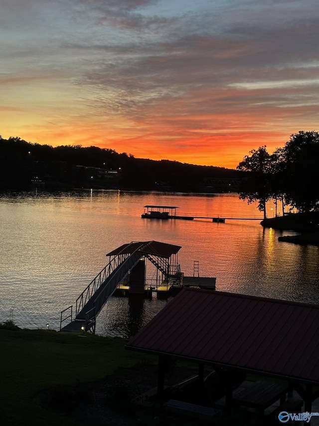 view of dock with a water view