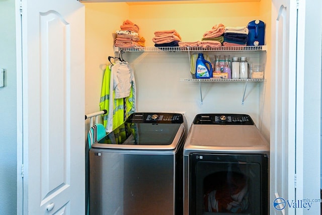 washroom with separate washer and dryer